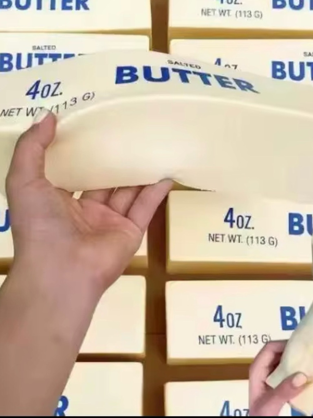9.5 GIANT Squishy Butter-shaped Stress Toy - Cream with Blue Logo